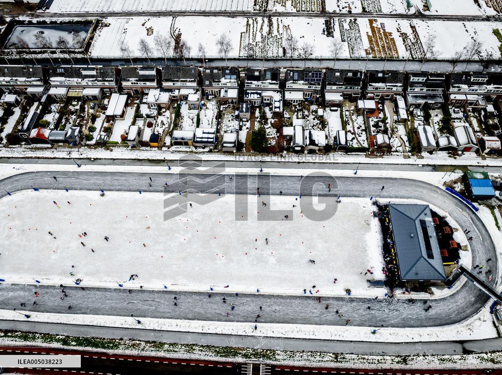 People Skate on Natural Ice Rink in Boskoop - Netherlands