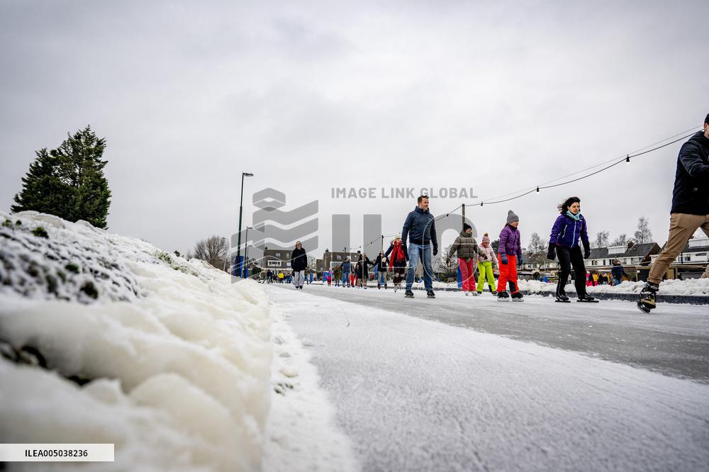 People Skate on Natural Ice Rink in Boskoop - Netherlands