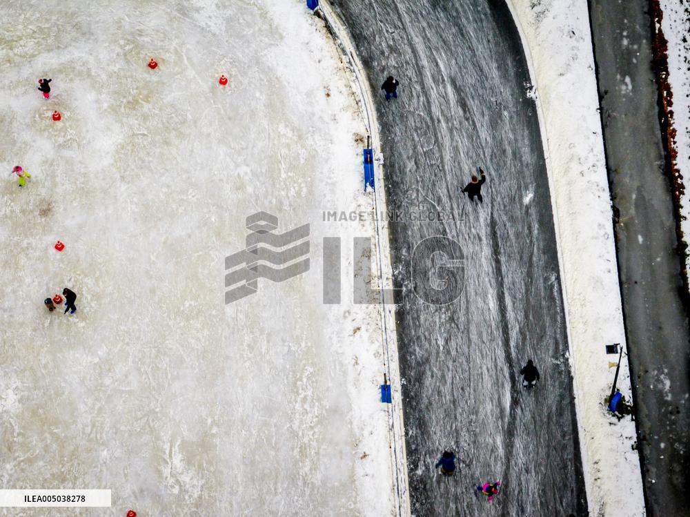 People Skate on Natural Ice Rink in Boskoop - Netherlands