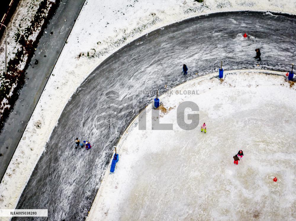 People Skate on Natural Ice Rink in Boskoop - Netherlands