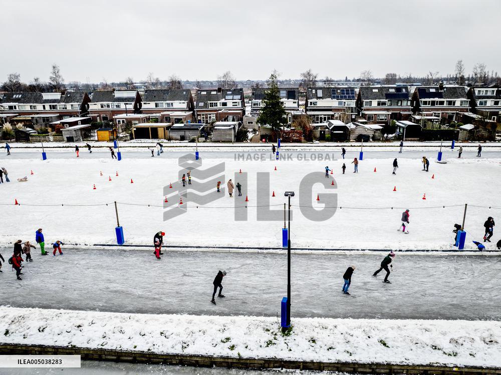 People Skate on Natural Ice Rink in Boskoop - Netherlands