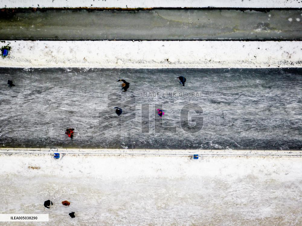 People Skate on Natural Ice Rink in Boskoop - Netherlands