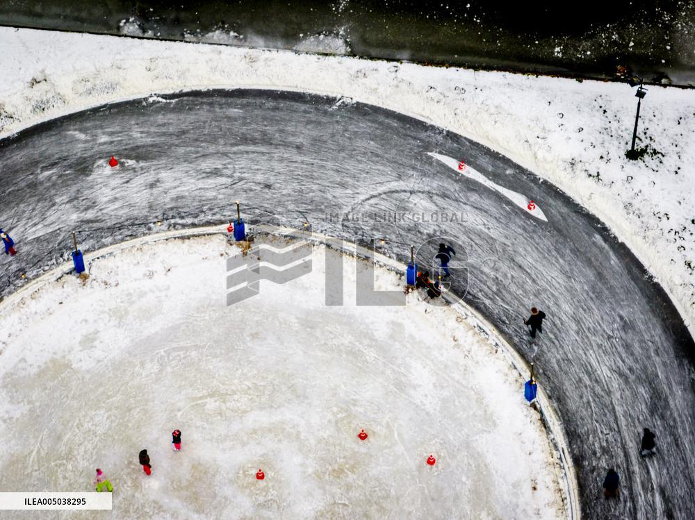 People Skate on Natural Ice Rink in Boskoop - Netherlands
