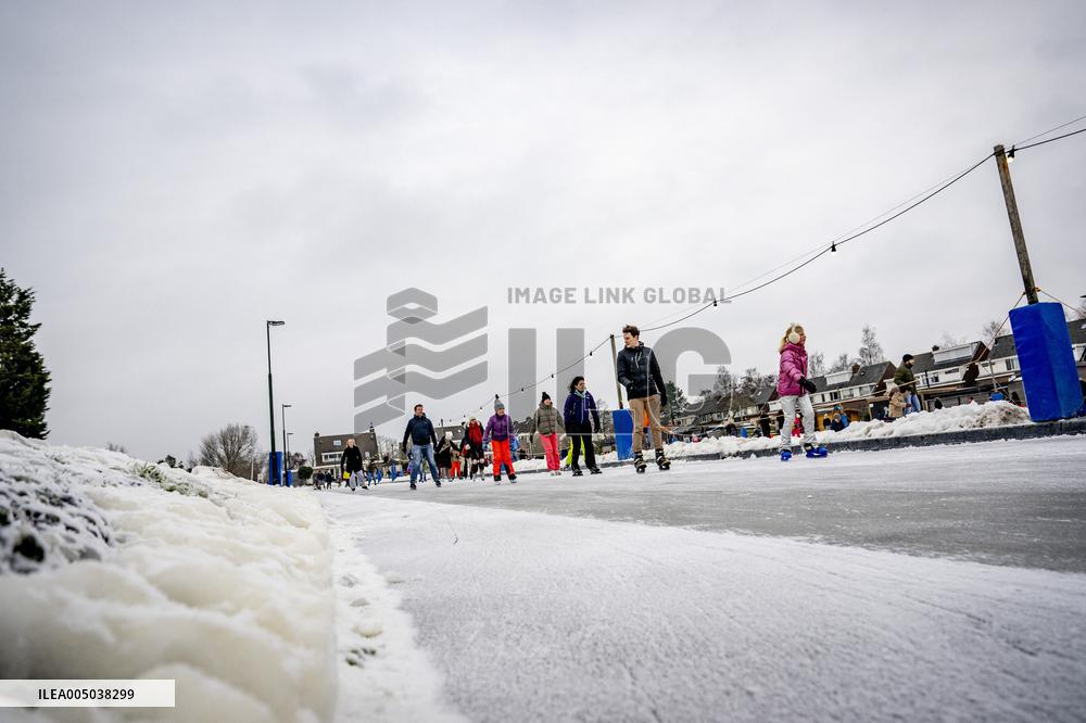 People Skate on Natural Ice Rink in Boskoop - Netherlands