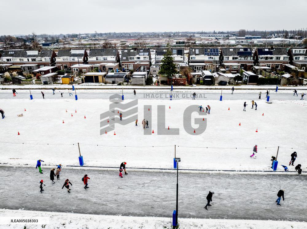 People Skate on Natural Ice Rink in Boskoop - Netherlands