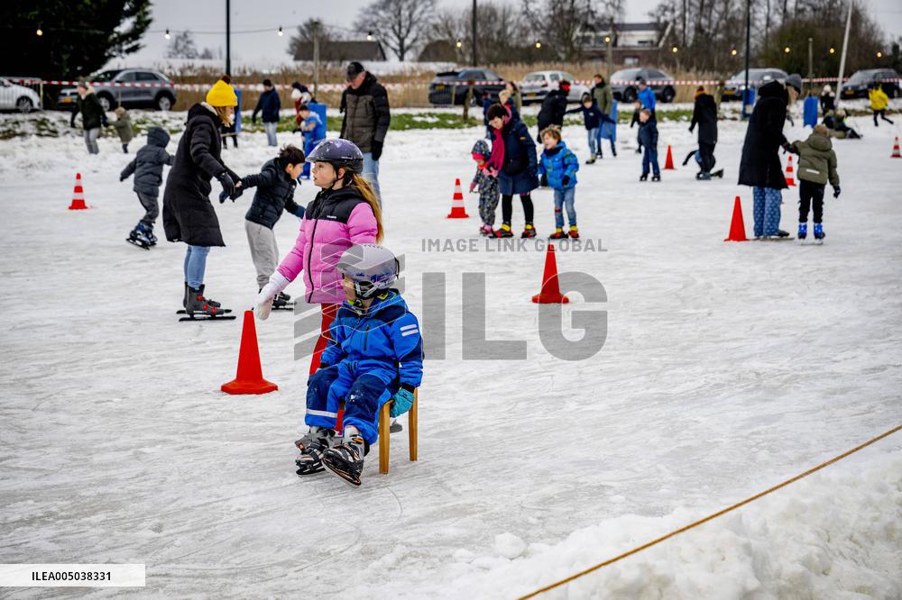 People Skate on Natural Ice Rink in Boskoop - Netherlands