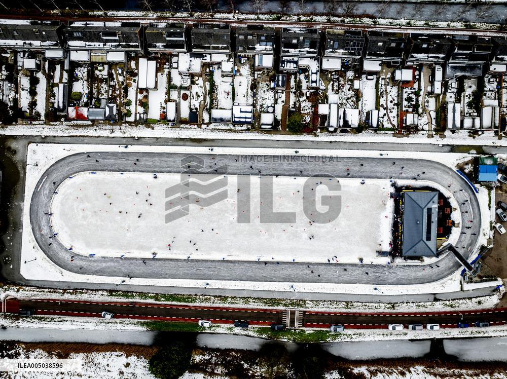 People Skate on Natural Ice Rink in Boskoop - Netherlands