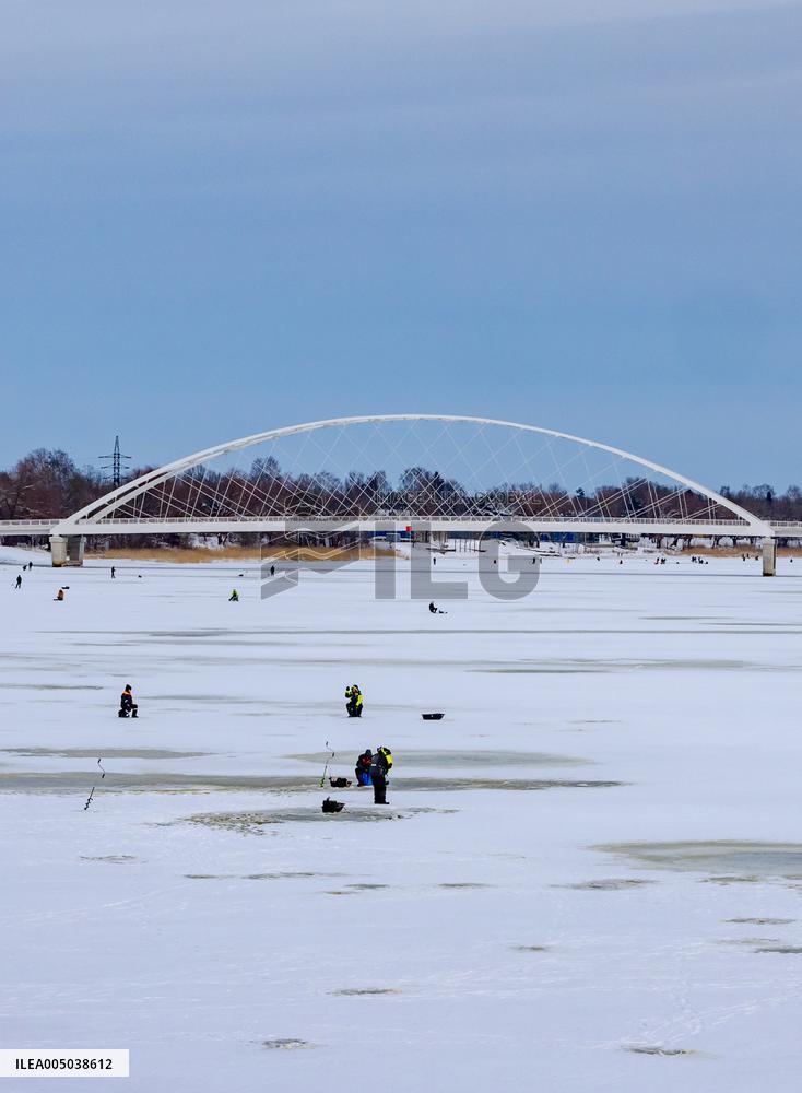 Fishermen at winter