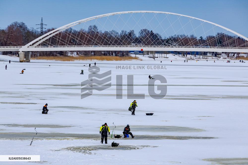 Fishermen at winter