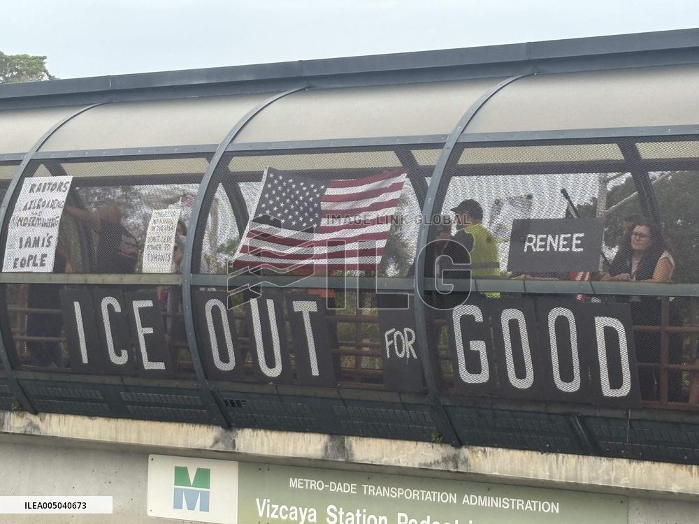 Protesters Demonstrate Against ICE on Bridge - Miami