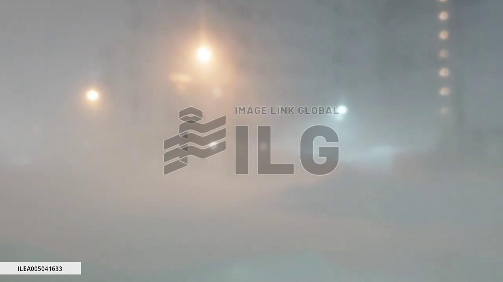 Japan: Blizzard Conditions Reduce Visibility in Sapporo