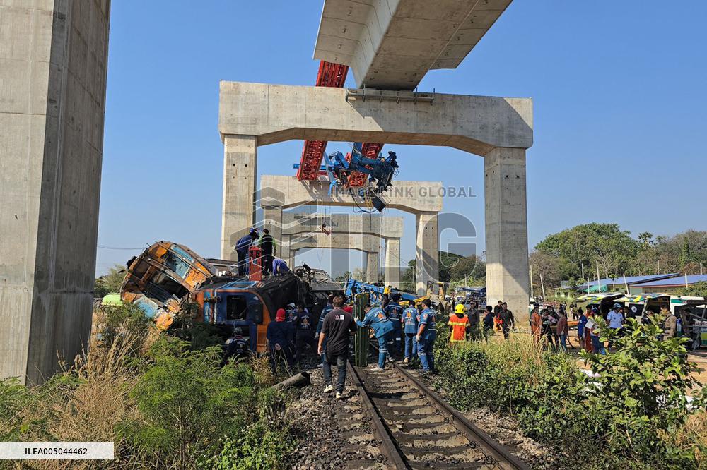 At Least 22 Dead as Crane Collapses onto Train - Thailand