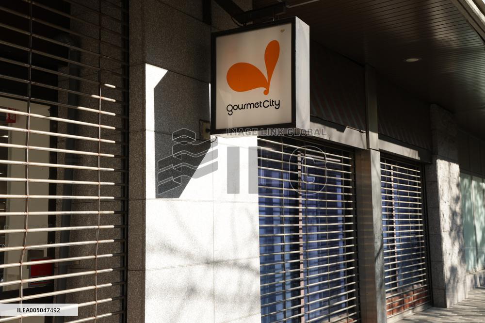 Gourmet City signboard and logo