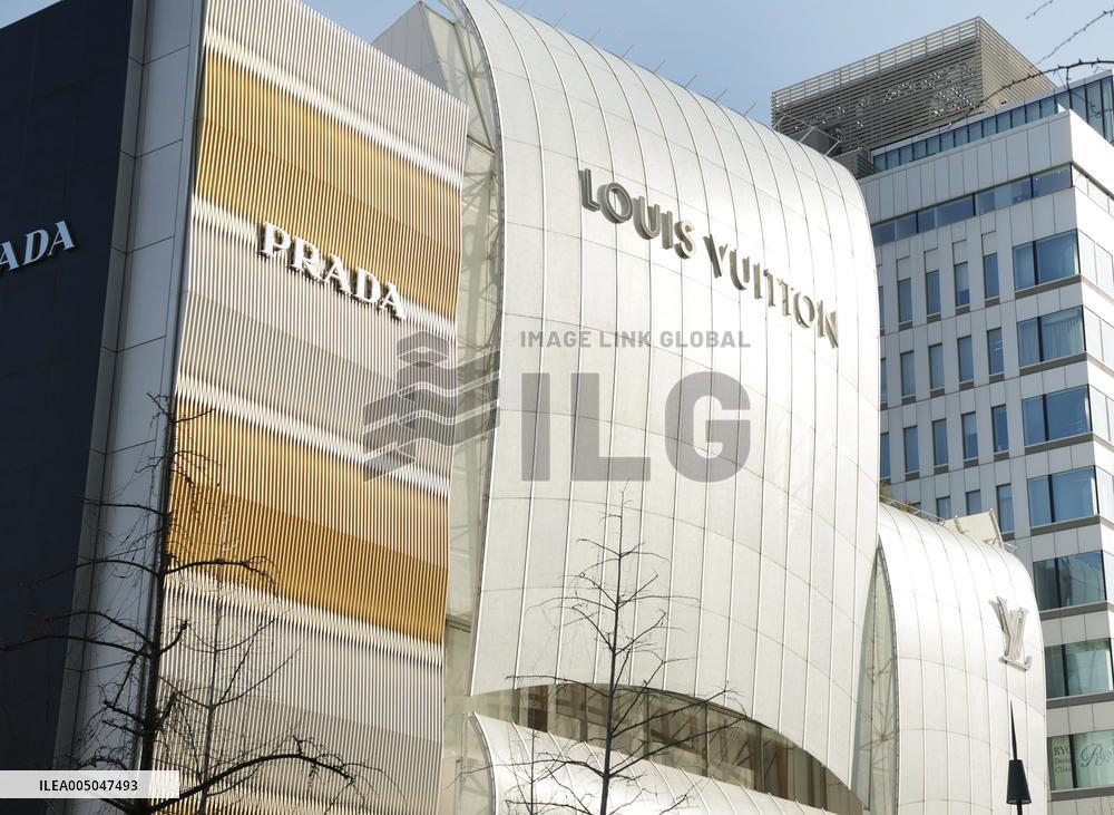 Louis Vuitton, Prada signs and logos