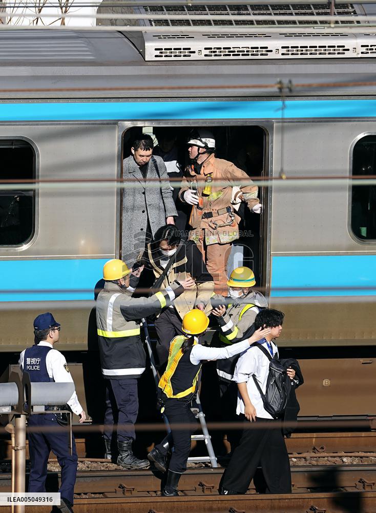 CORRECTED: Power outage stops train in Japan