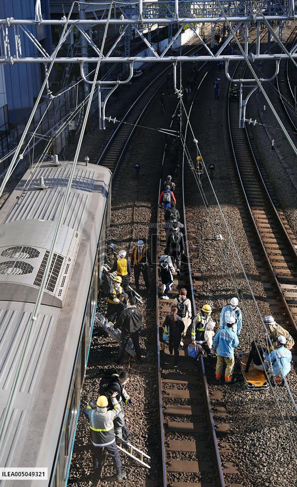 CORRECTED: Power outage stops train in Japan