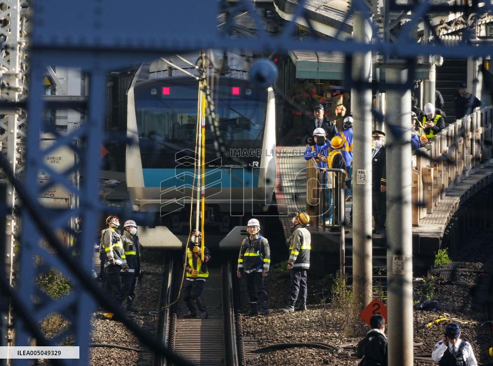 CORRECTED: Power outage stops train in Japan