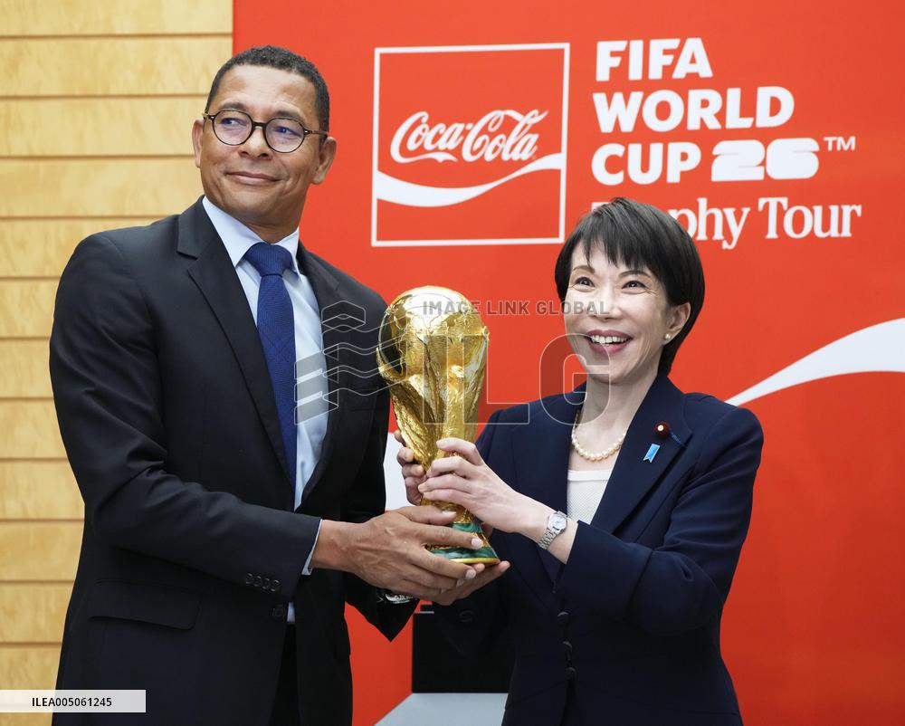 Japan PM Takaichi with FIFA trophy