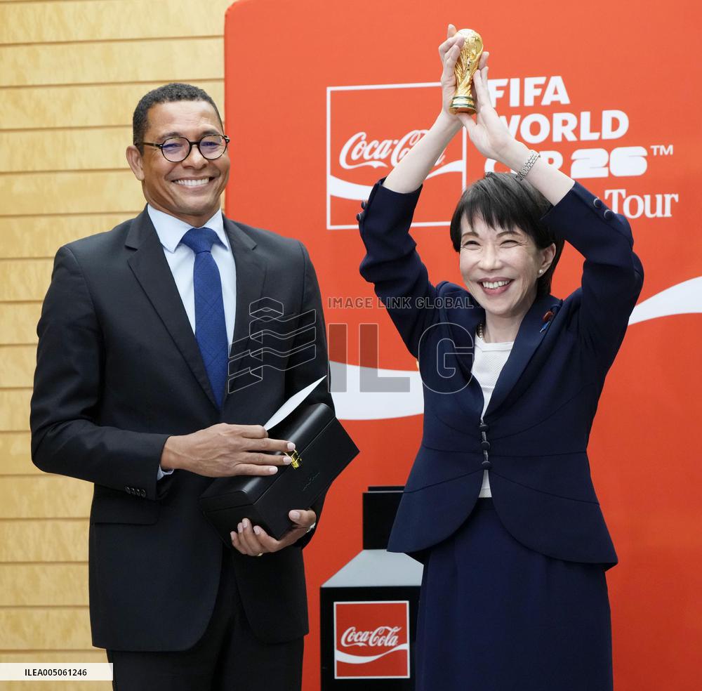 Japan PM Takaichi with FIFA trophy
