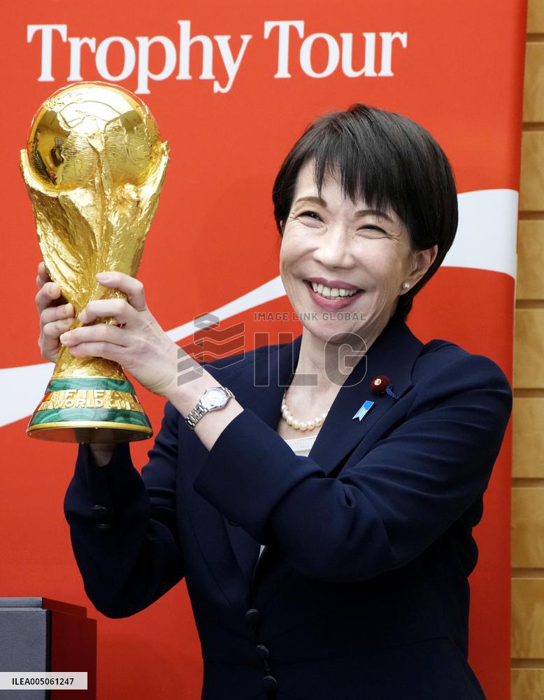 Japan PM Takaichi with FIFA trophy