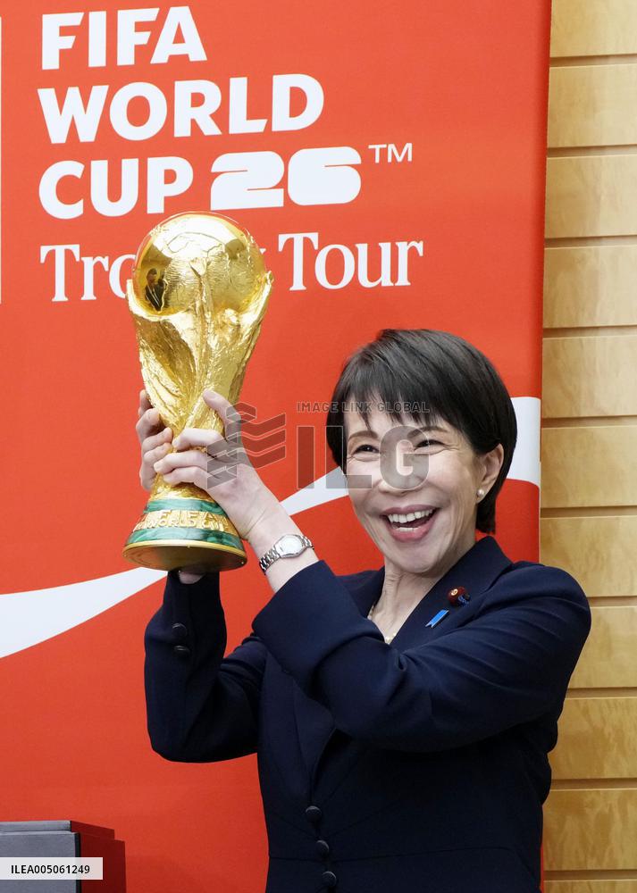 Japan PM Takaichi with FIFA trophy