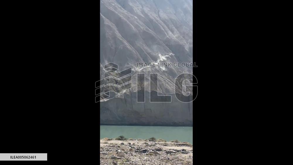China: Wild Mountain Goats Race Across Steep Rock Face in Zhejiang