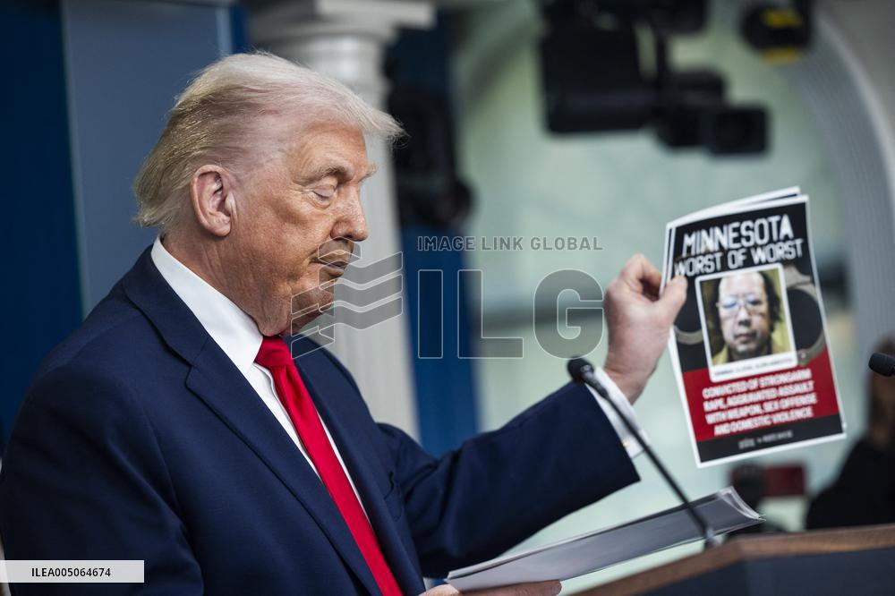 US President Trump speaks on to reporters ahead of trip to Davos