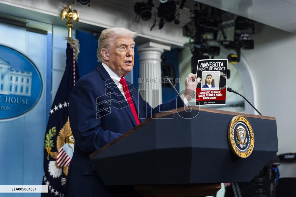 US President Trump speaks on to reporters ahead of trip to Davos