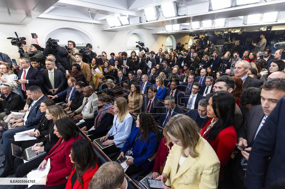 US President Trump speaks on to reporters ahead of trip to Davos