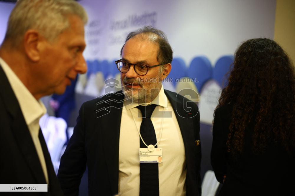 Macron and with leaders of AI companies at World Economic Forum annual meeting - Davos