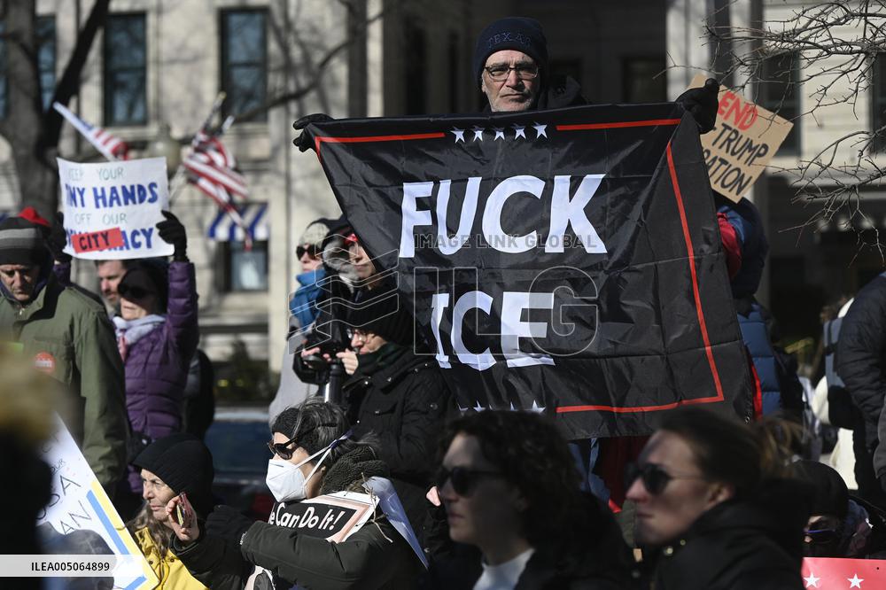 People protest on the first anniversary of President Donald Trump's second term in office
