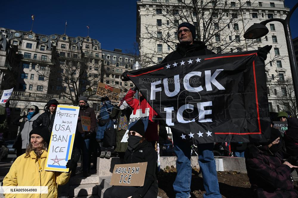 People protest on the first anniversary of President Donald Trump's second term in office