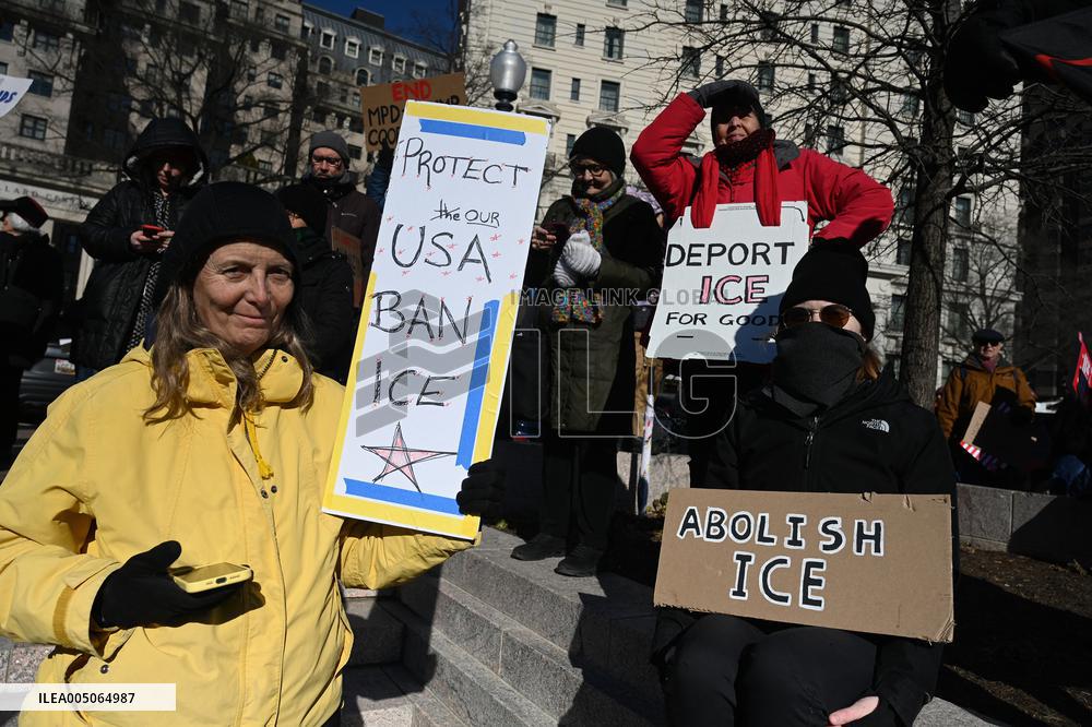 People protest on the first anniversary of President Donald Trump's second term in office