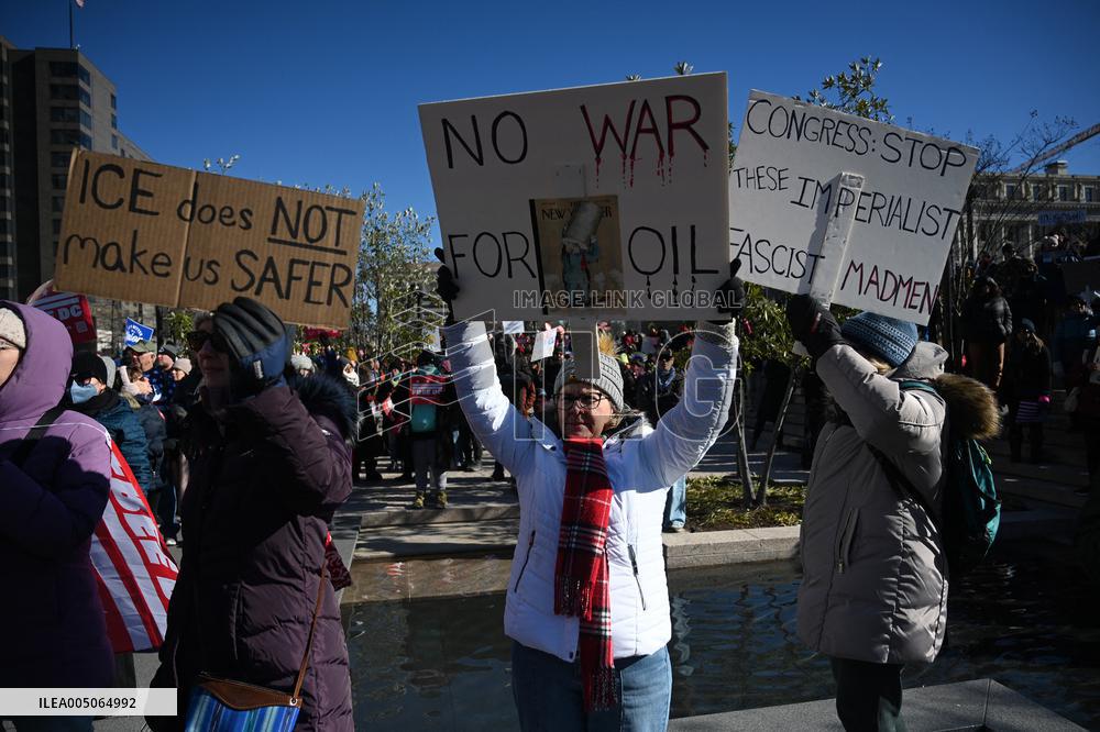 People protest on the first anniversary of President Donald Trump's second term in office