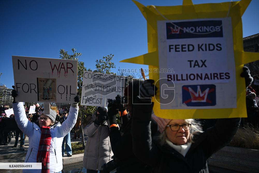 People protest on the first anniversary of President Donald Trump's second term in office