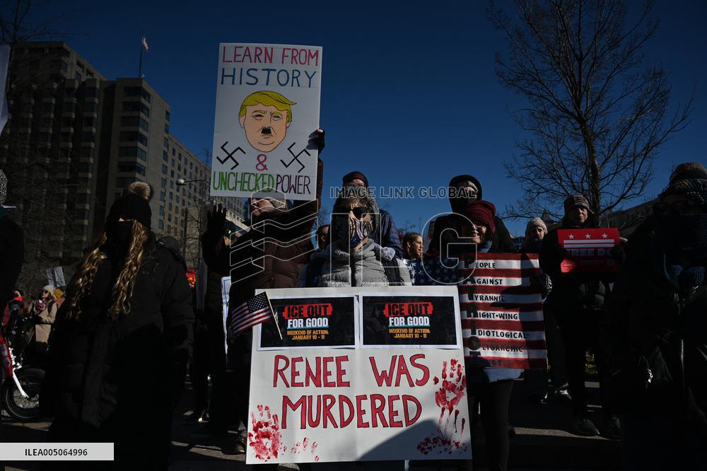 People protest on the first anniversary of President Donald Trump's second term in office