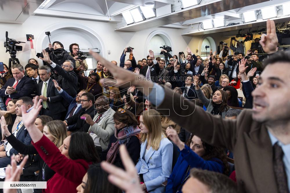 US President Trump speaks on to reporters ahead of trip to Davos