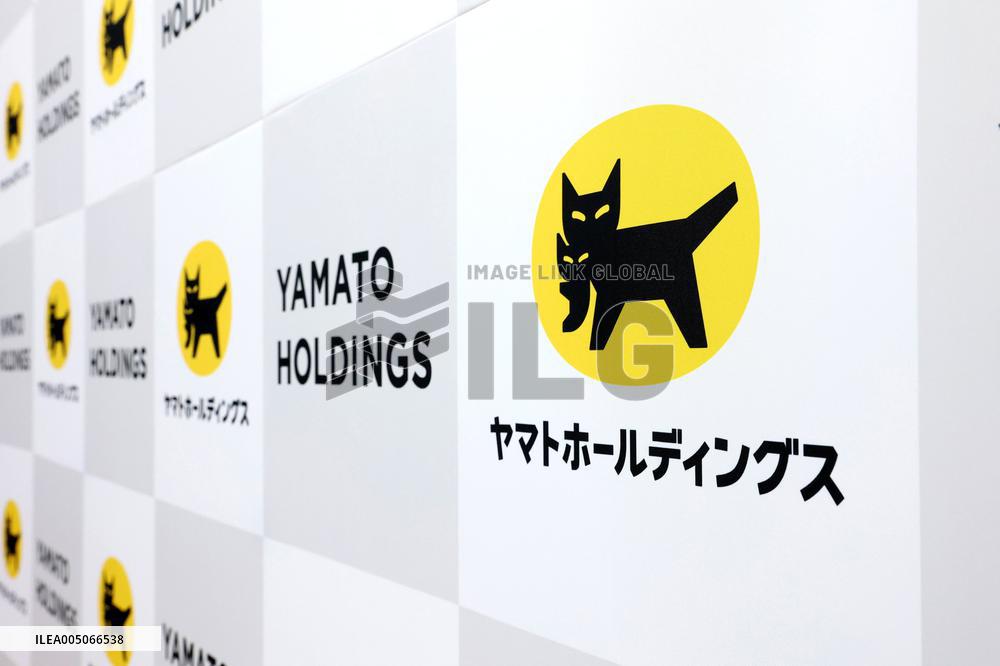 Yamato Holdings signboard and logo