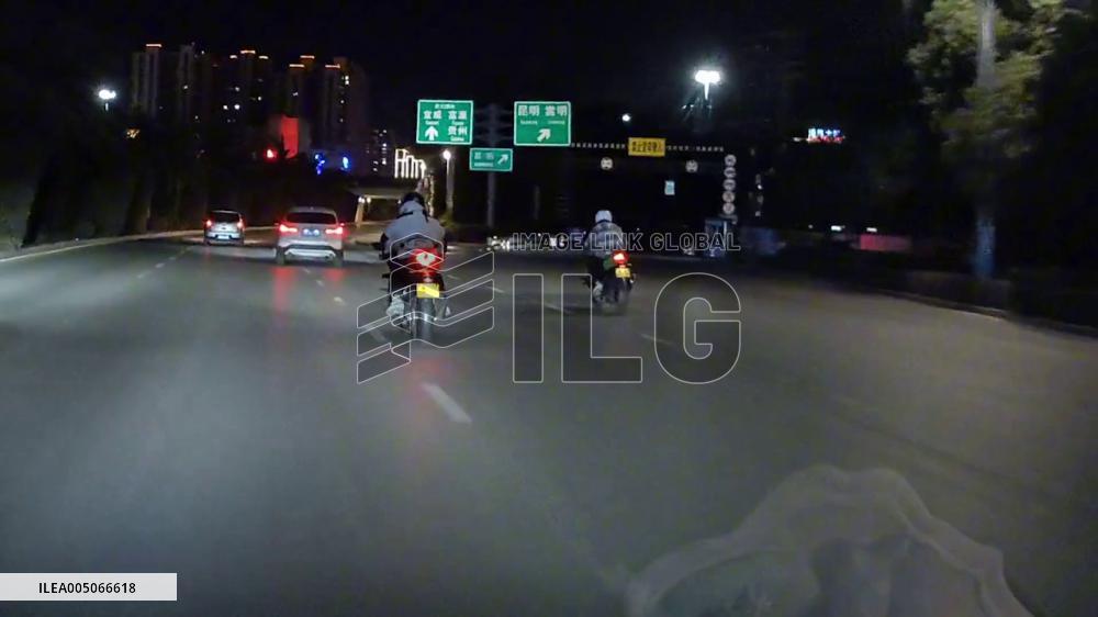 China: Motorcyclist Thrown From Bike After Hitting Curb