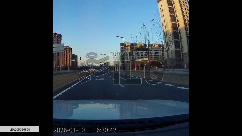 China: Child Falls from Car After Rear Door Opens During Turn