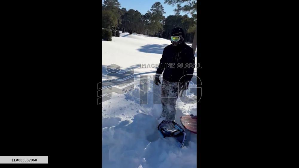 US: Man Dives Into Deep Snow After Record Snowfall in North Carolina