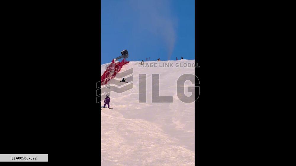 China: Snowboarder Loses Control and Tumbles Down Snowy Slope in Xinjiang
