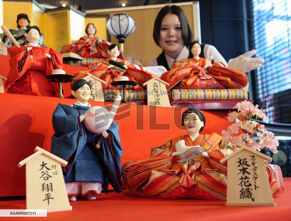 Traditional "hina" dolls featuring big names in Japan
