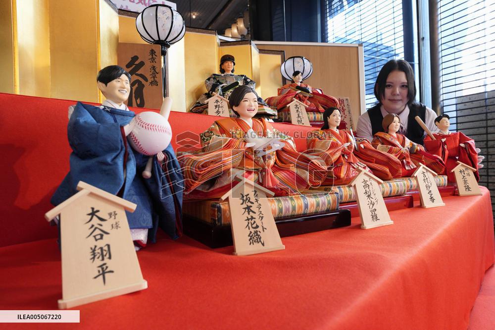 Traditional "hina" dolls featuring big names in Japan