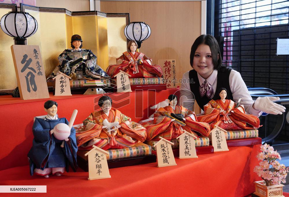 Traditional "hina" dolls featuring big names in Japan