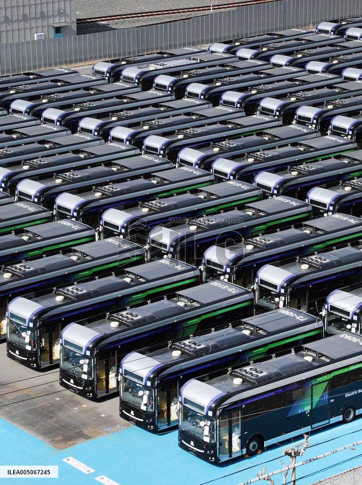 Approximately 150 EV buses gathered at a vast site in Morinomiya, Osaka.