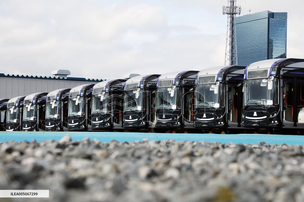 Approximately 150 EV buses gathered at a vast site in Morinomiya, Osaka.
