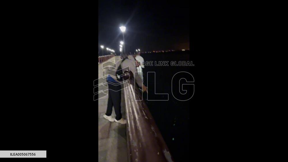 China: Man Sprayed With Squid Ink While Night Fishing in Hainan