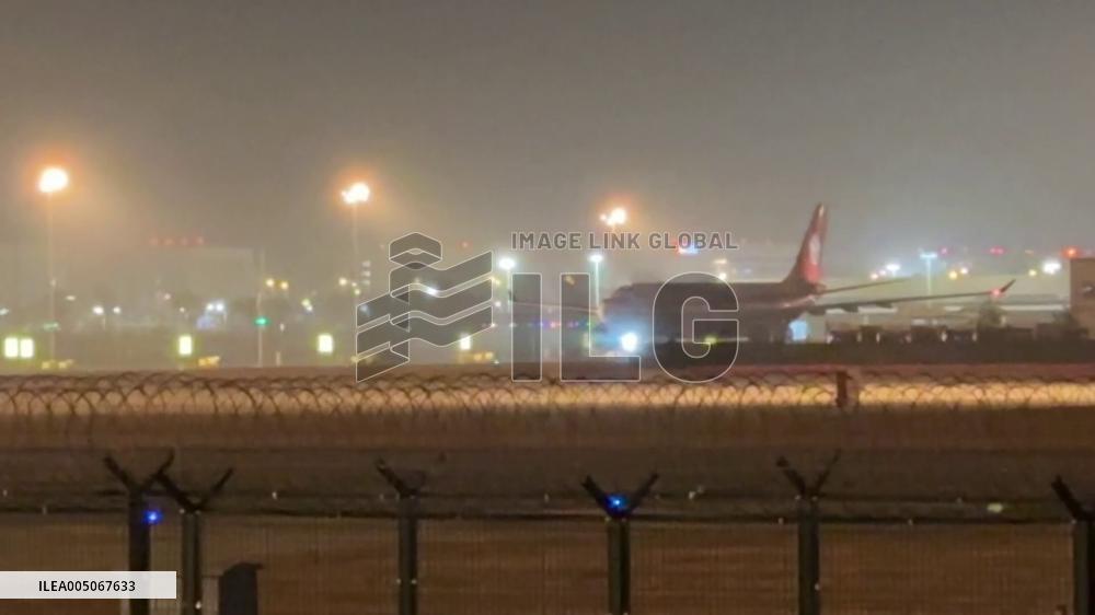 Twin giant pandas' arrival in China from Japan