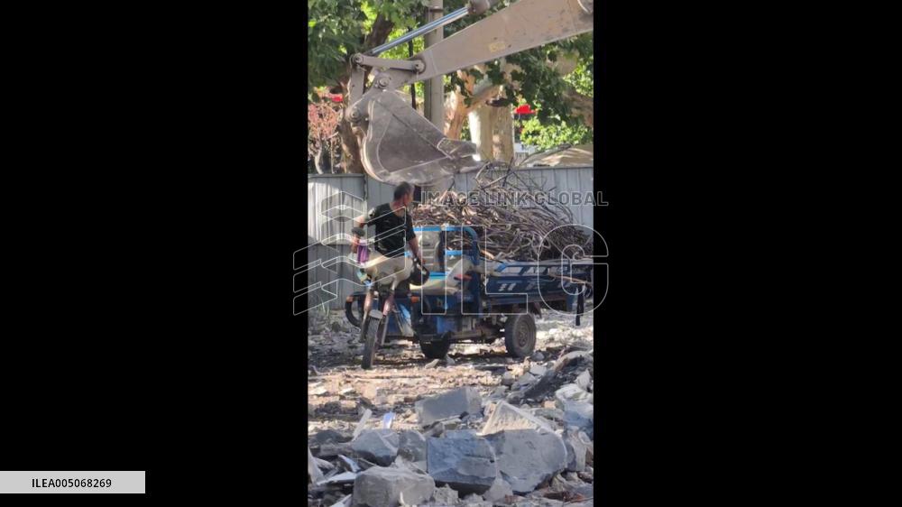 China: Tricycle Lifts Off Front Wheels After Being Overloaded With Steel